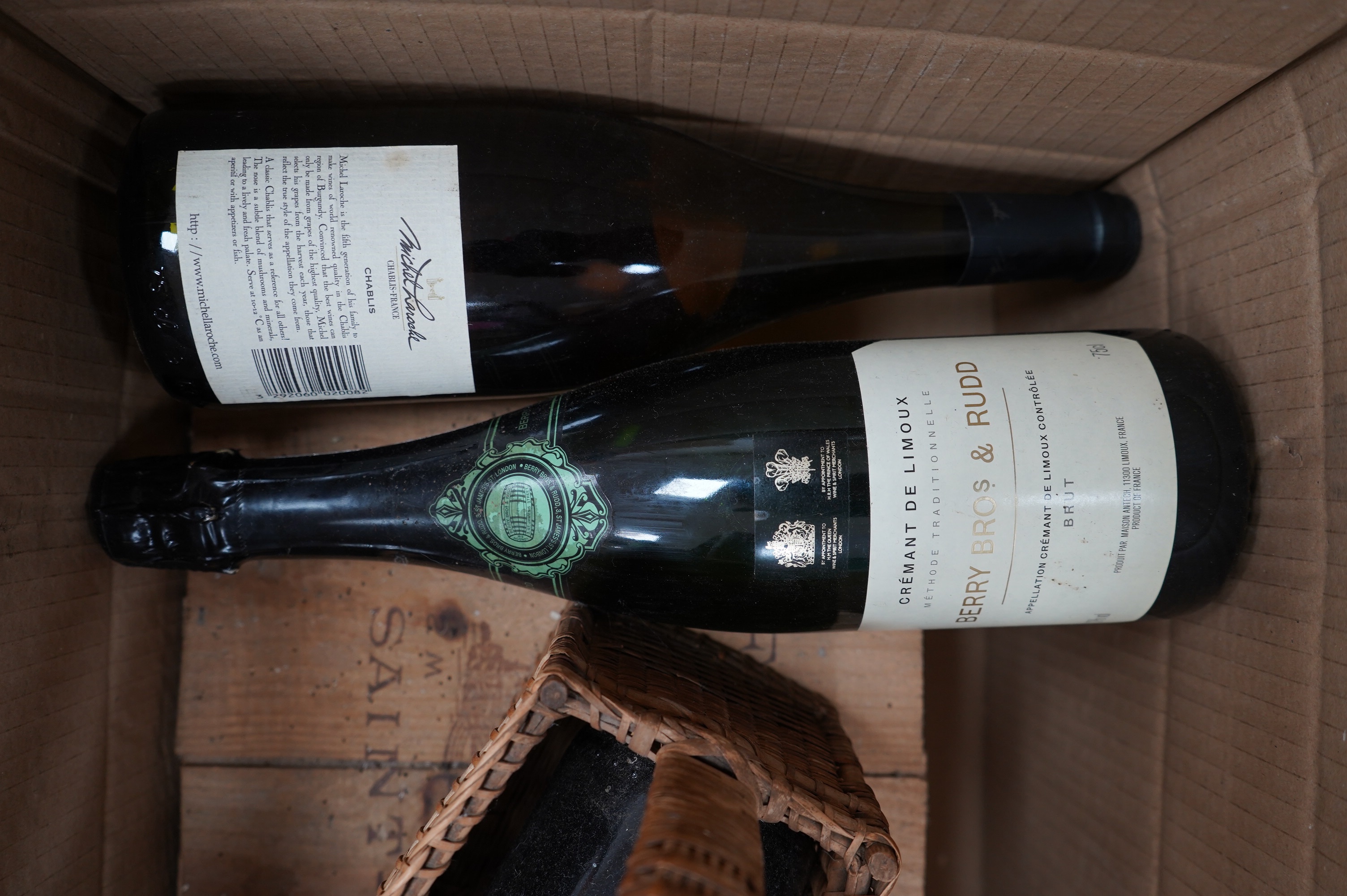 Two large bottles of Chateau Fombrange in wooden crate and three other bottles. Condition - fair, storage unknown